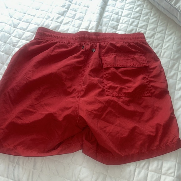 Gently use men’s polo size. Small shorts. - Picture 6 of 6